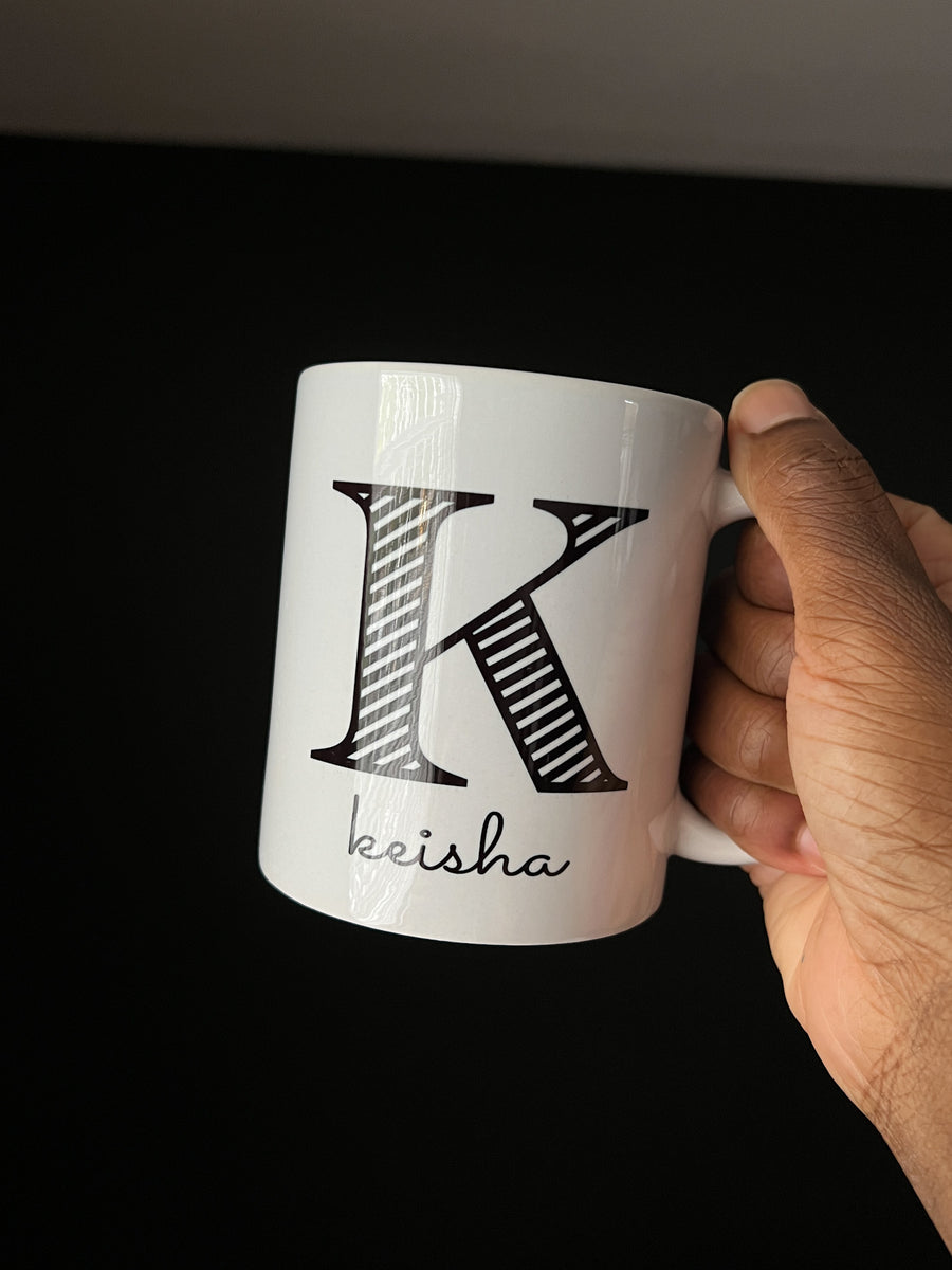 http://www.sheillustrates.com/cdn/shop/files/custom-k-initial-coffee-mug-1_053fab7b-5594-4c66-a3d5-be1443fb4bce_1200x1200.jpg?v=1701553016